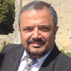 Claude A.